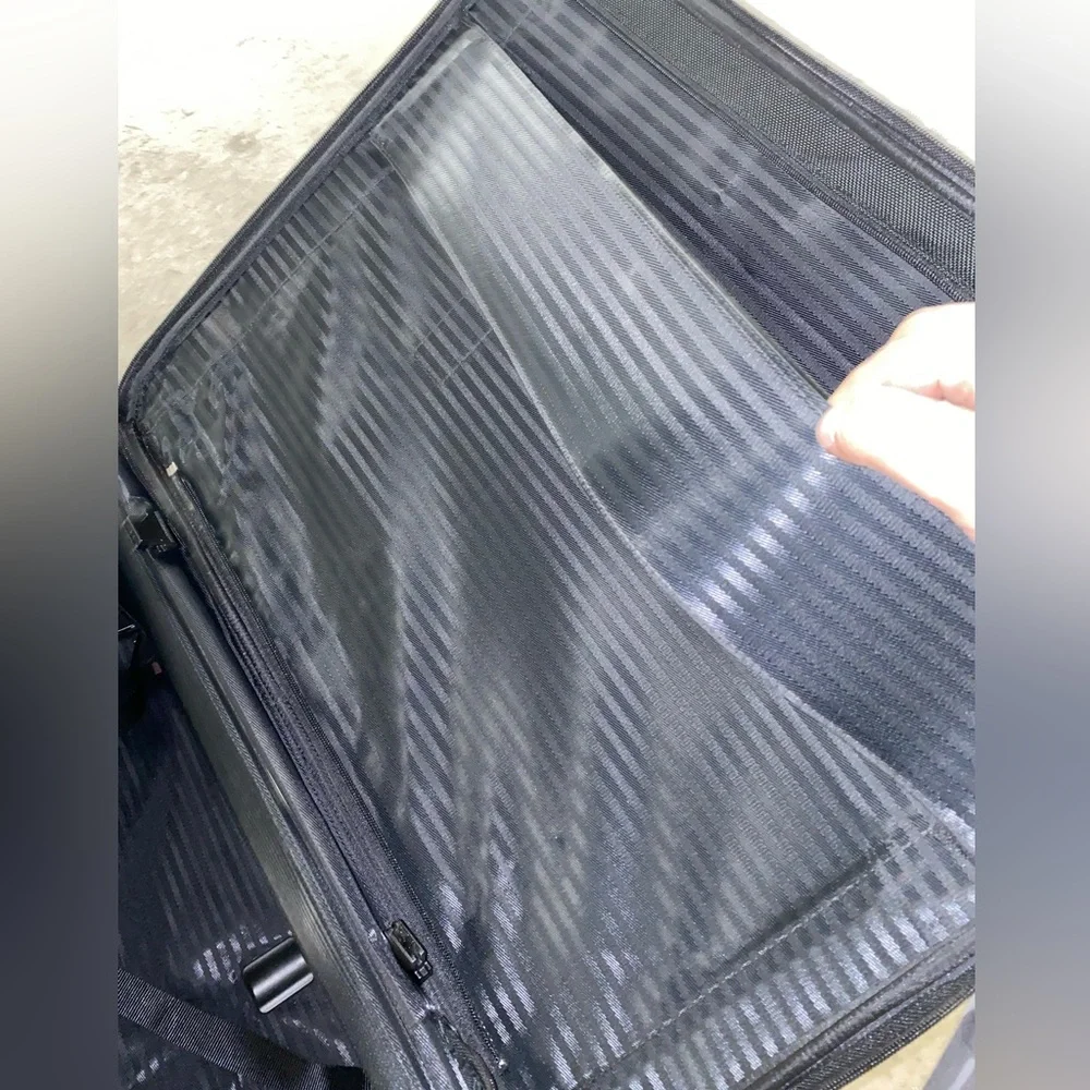 TUMI Check On Suitcase